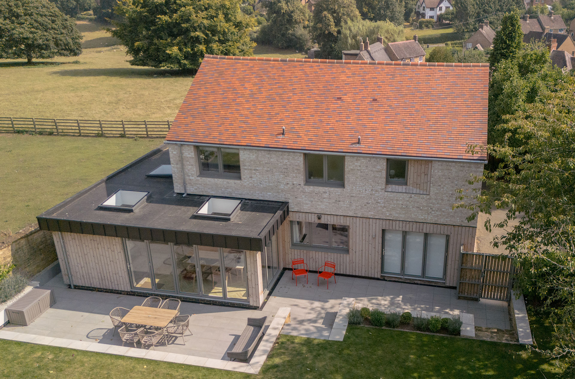 a mixed blended clay roof of brown antique blue brindle and country brown Dreadnought tiles